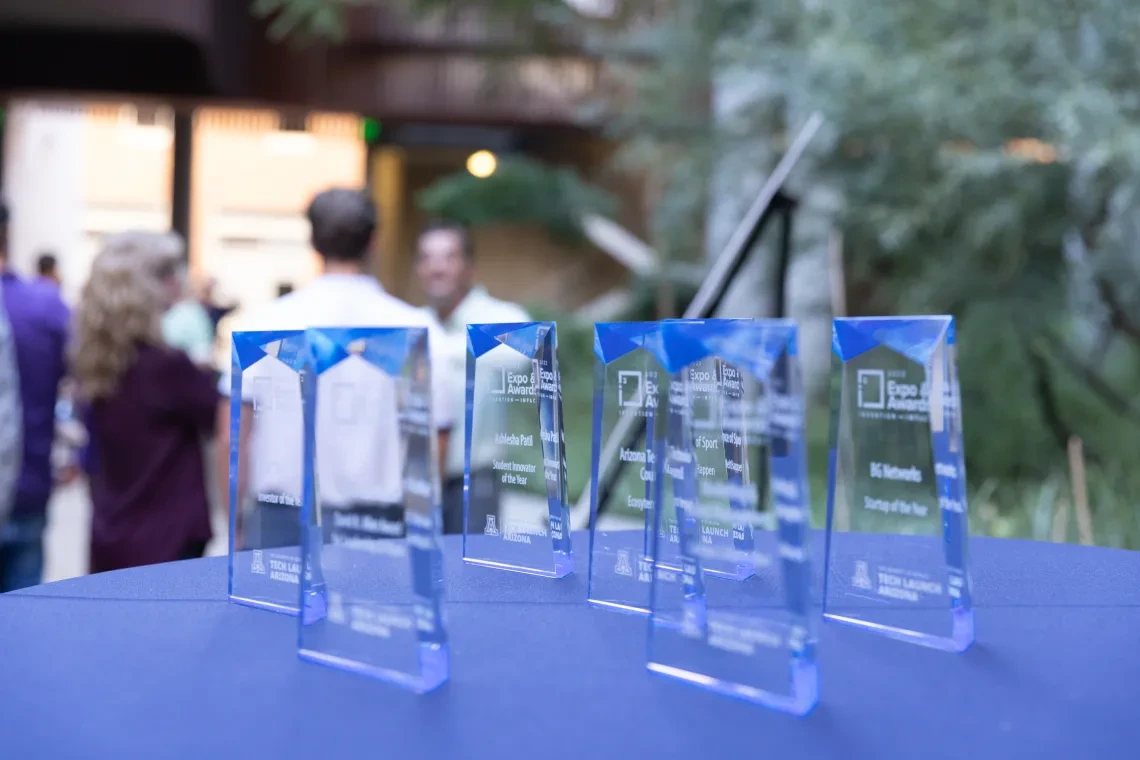 A photograph of the engraved I-Squared awards.