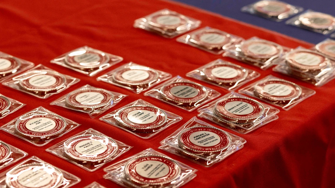 Patent coins on a table.