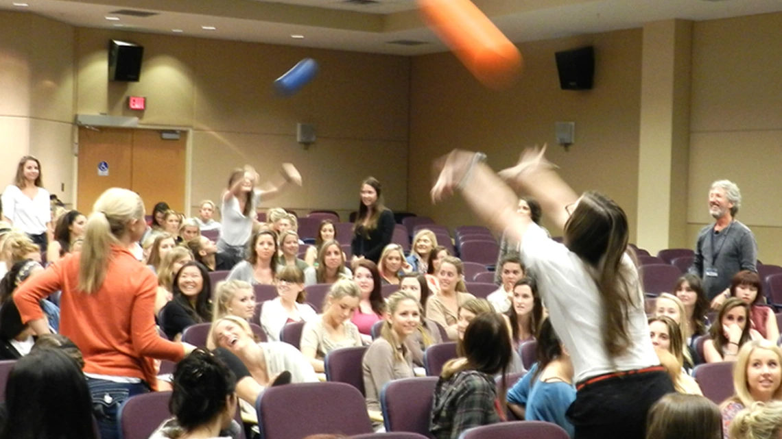 Spencer Gorin (far right) facilitates The Buzz program for an audience of students. Spencer Gorin (far right) facilitates The Buzz program for an audience of students.