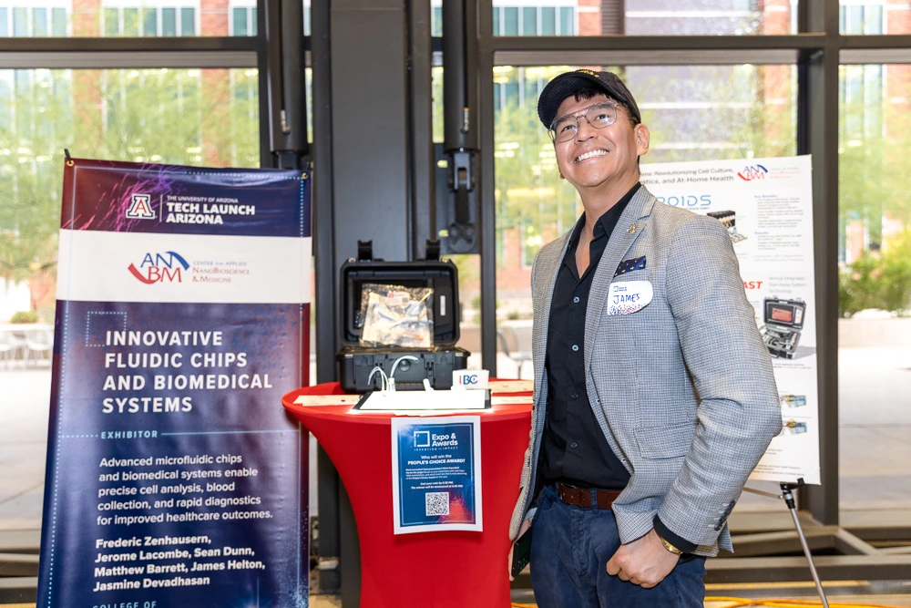 James Helton presents his team's invention, fluidic chips. 